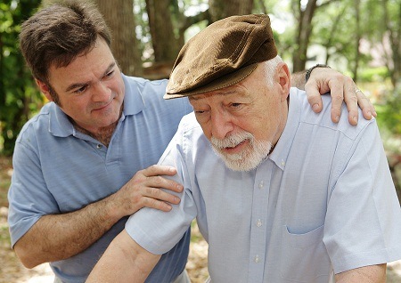 Worried son with father photo