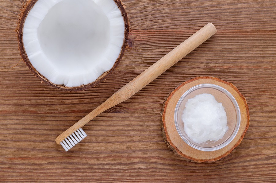 coconut oil toothpaste, natural alternative for healthy teeth, wooden toothbrush, dental equipment, flat